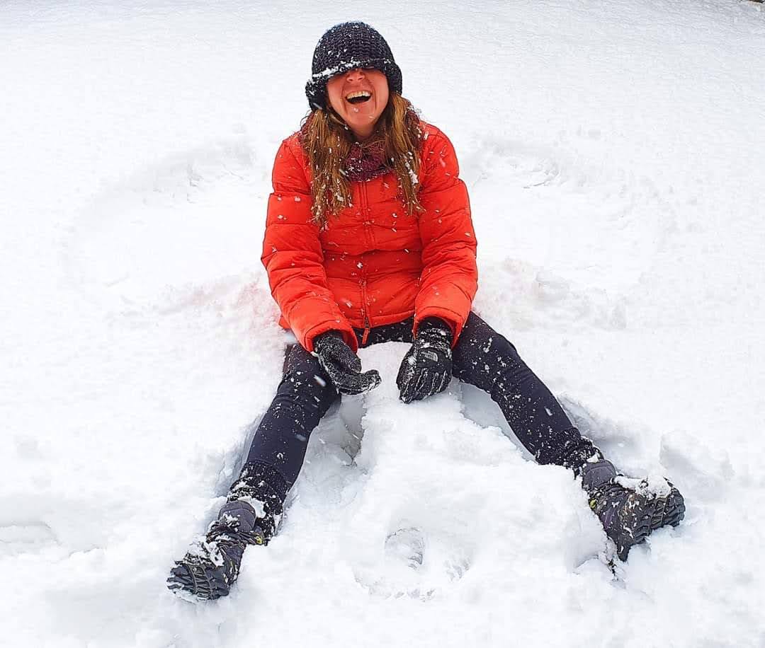 Vanessa sitting in the snow