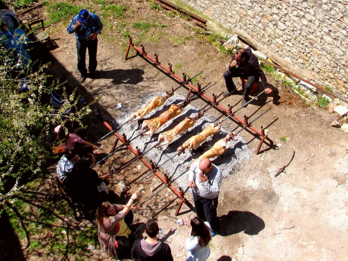 Easter in Greece celebrations - People grill lamb