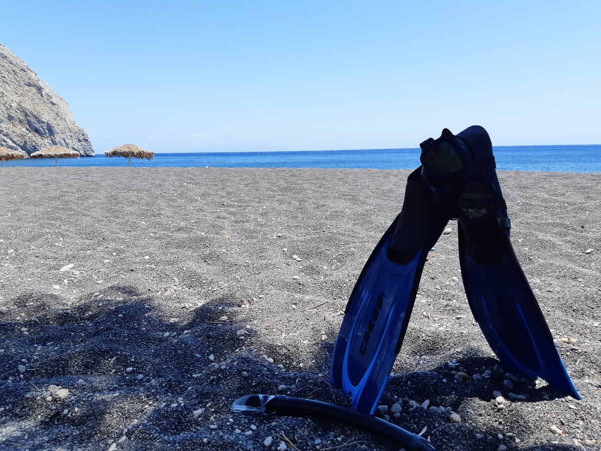 Enjoy the black beaches in Santorini