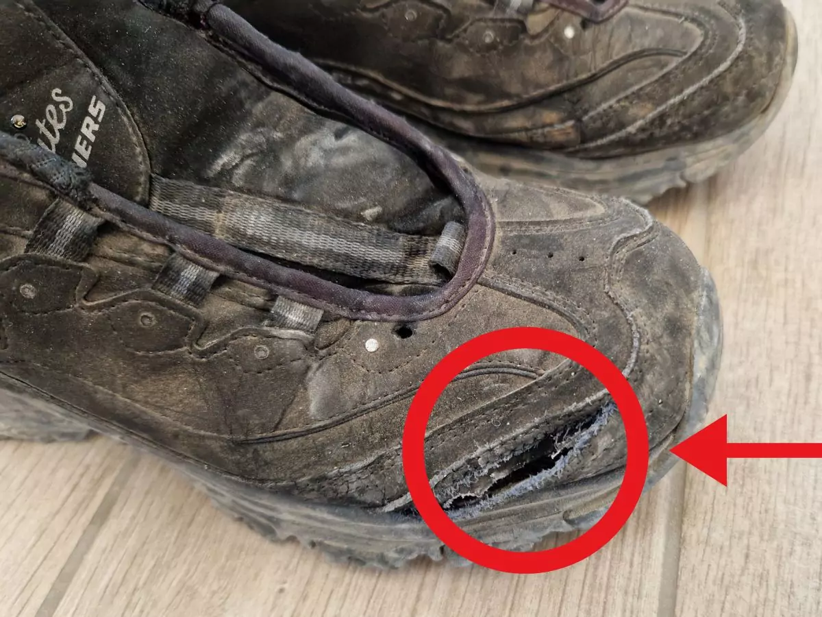 Damaged shoes after a long hike in Greece
