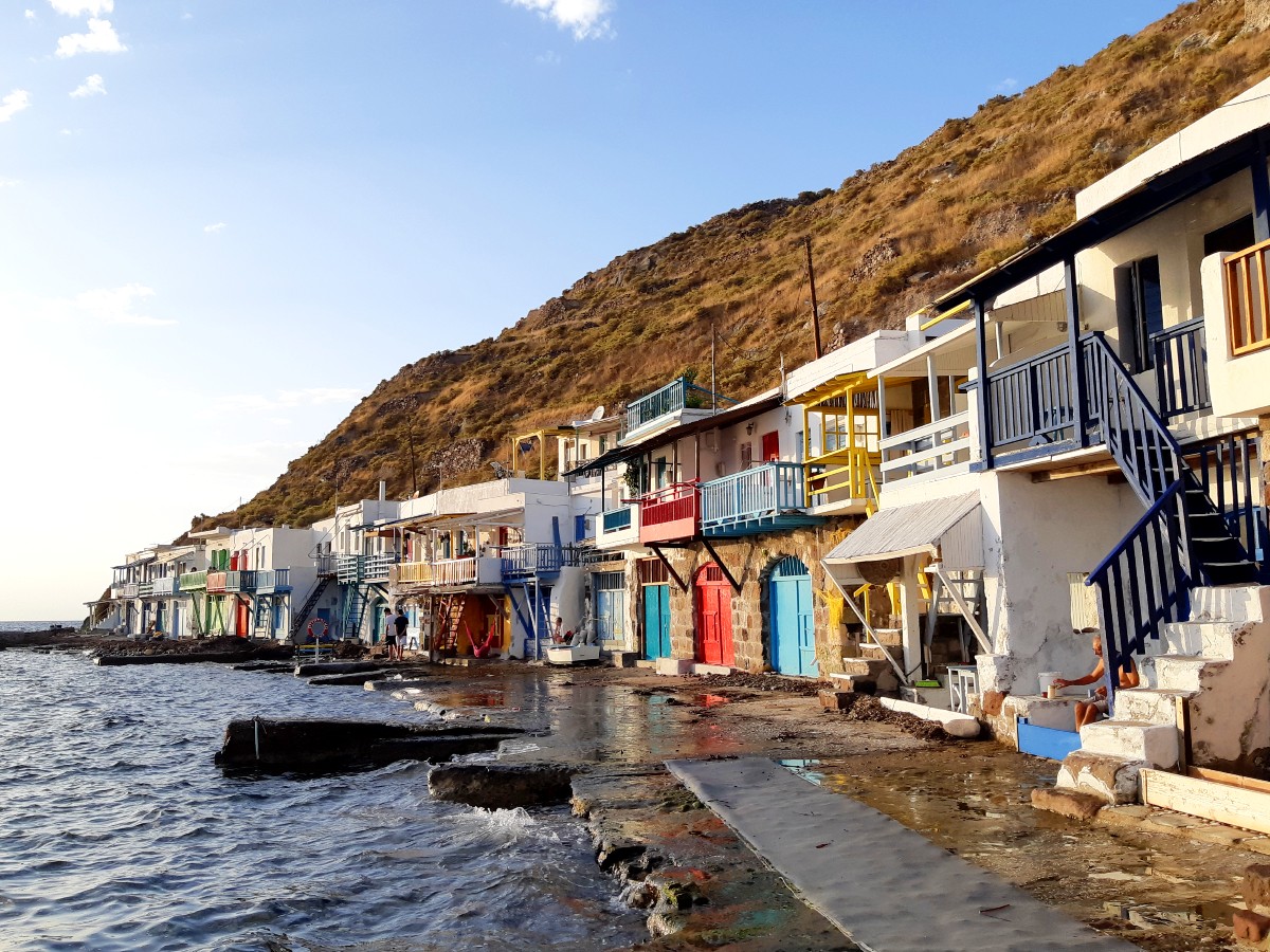 Colourful syrmata houses in Milos Greece