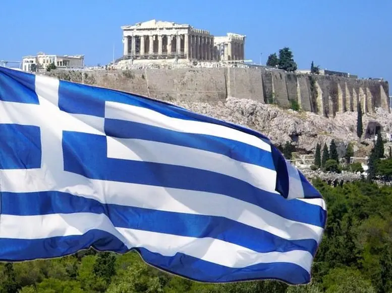 On the Oxi Day in Greece, people decorate their balconies with the Greek flag