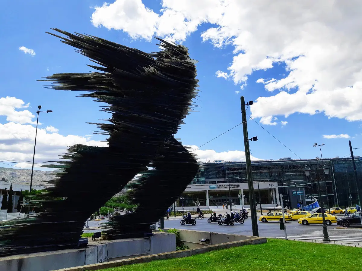 The runner glass statue in Athens Greece