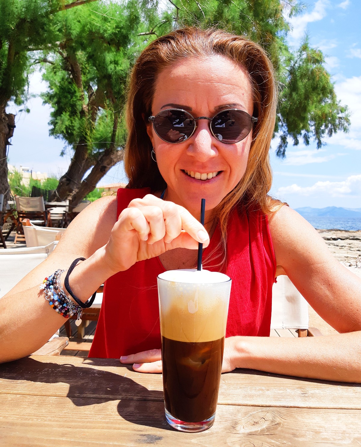 Vanessa from Real Greek Experiences with a coffee