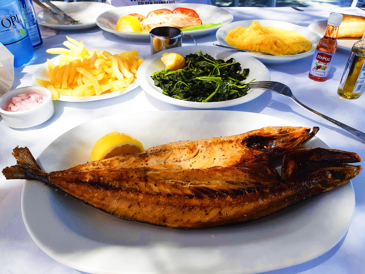 Grilled fish and horta meal in Greece