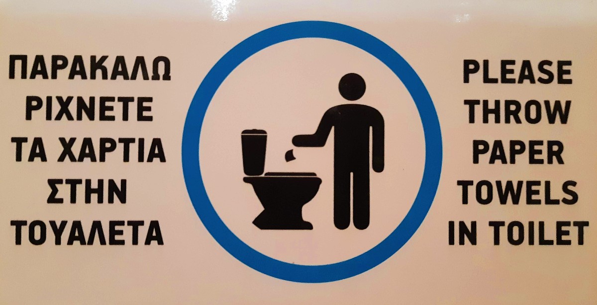 A sign in a toilet in Greece